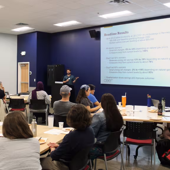 person giving a presentation to group of people