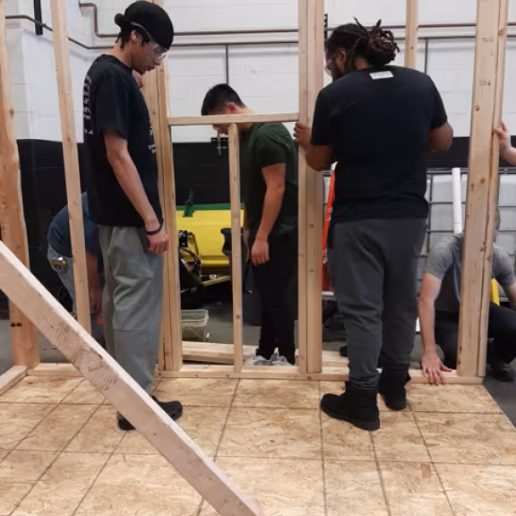 people working on building