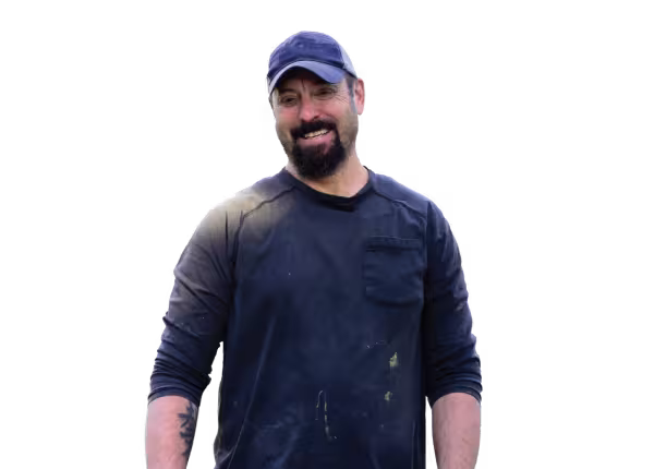 person with blue hat on and black long sleeve tee