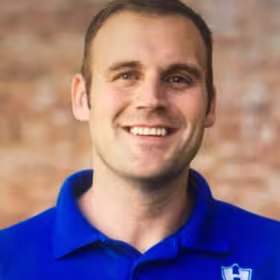 Headshot of Chris Hughes
